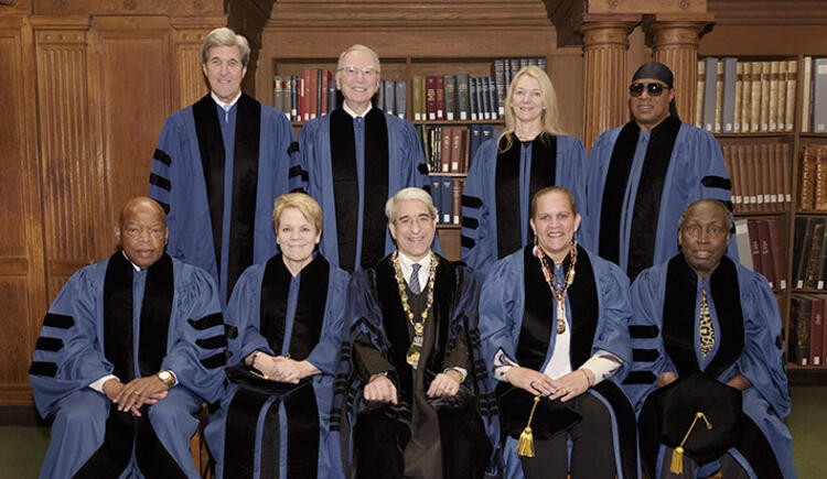Dr. Bargmann (third standing) in 2017 at Yale University, President Salovey granted her, and other seven outstanding professionals in their fields, an honorary degree.  